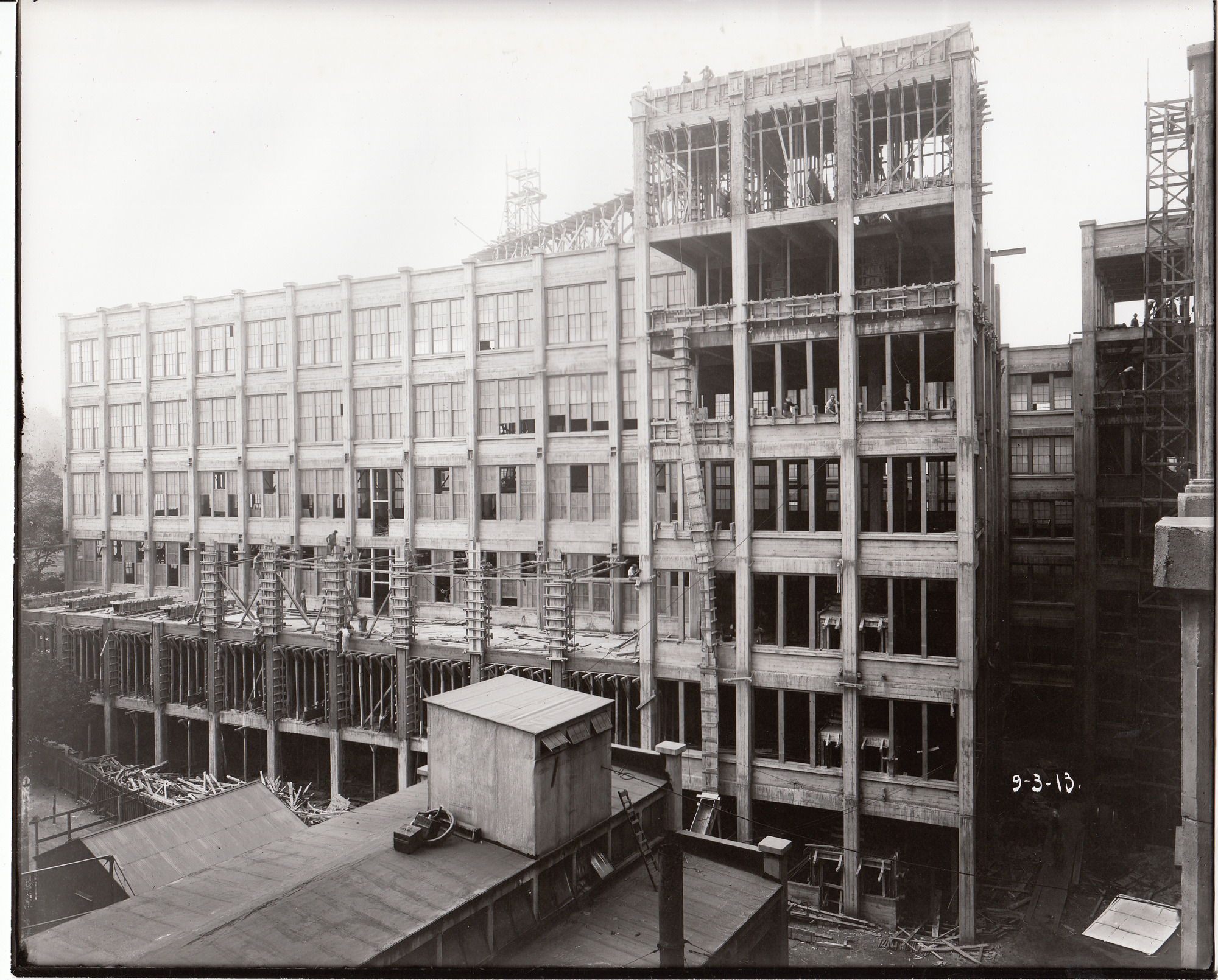 Storage Battery Building under construction, Building 137, rear view.