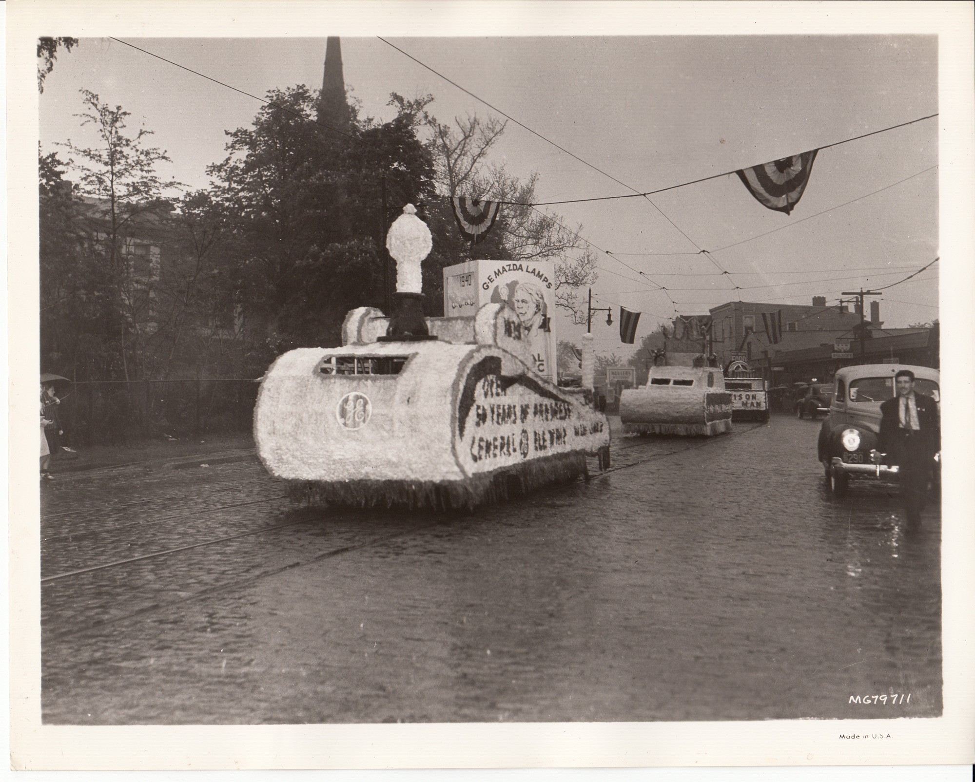 G.E. Mazda Lamps float in parade at the premiere of "Edison, the Man." "Over 50 Years of Progress"