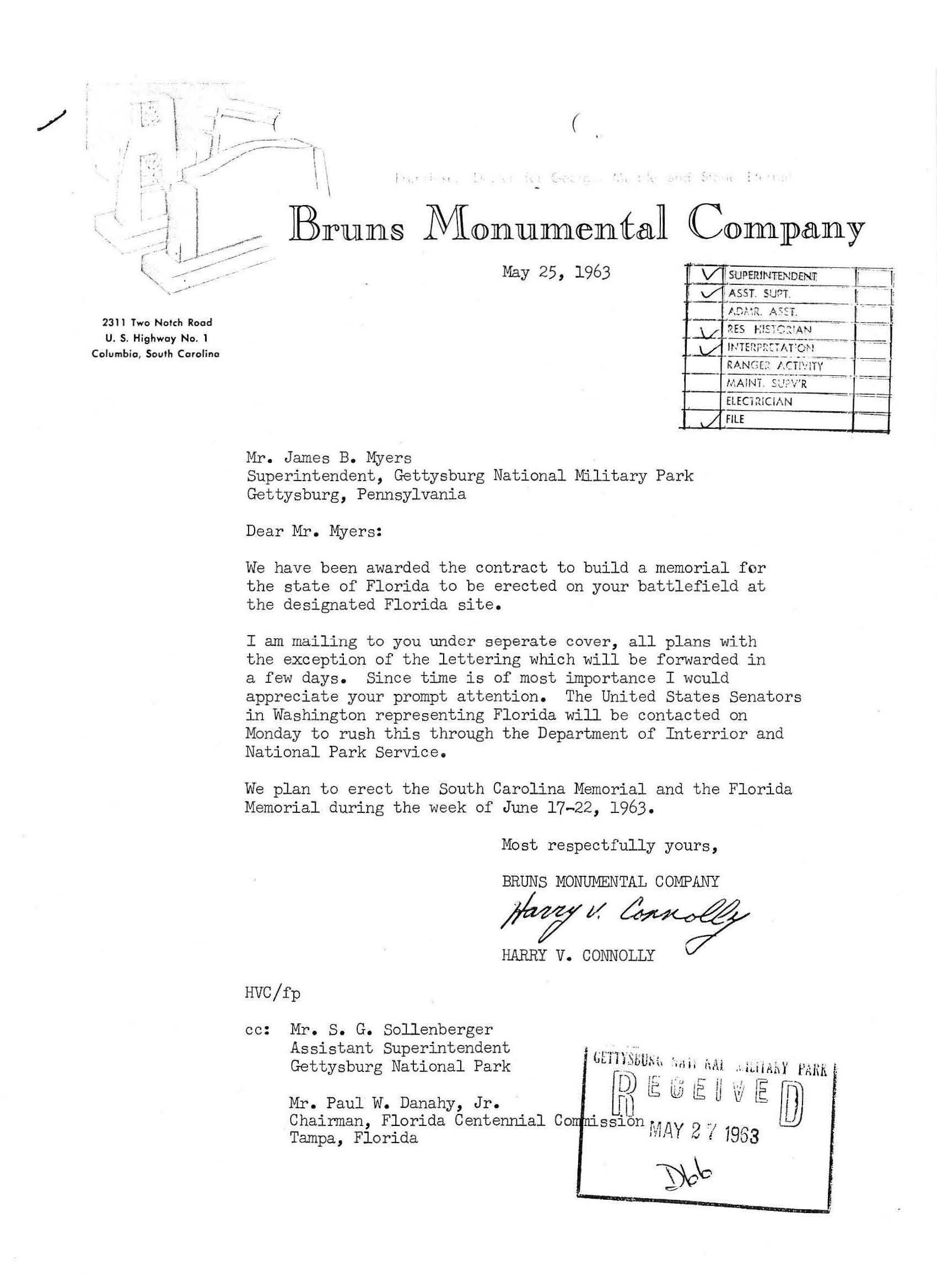 White paper with typed black text and a handwritten signature