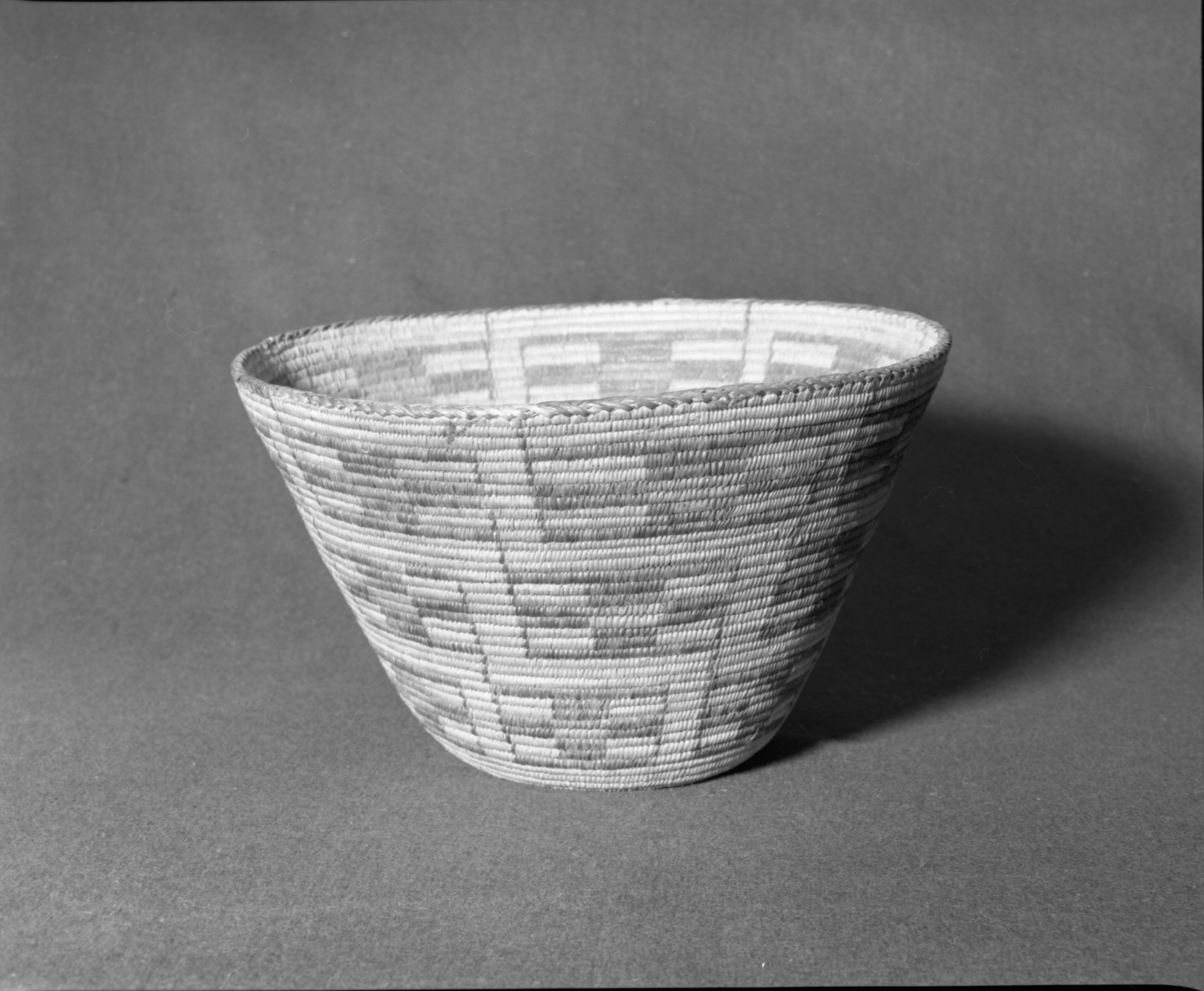Marie Rozier Collection, Catalog No. 72. Object: Pima basket. Dimensions: 15 x 9 1/4". Materials: willow, devil's cloth, cattail, dyed willow (?). Technology: ---. Collection History: Alice Reade Collection. Photographed by Michael Dixon, Dec. 1982. Catalogued by Craig Bates and Barbara Beroza. Yosemite Collections, National Park Service.