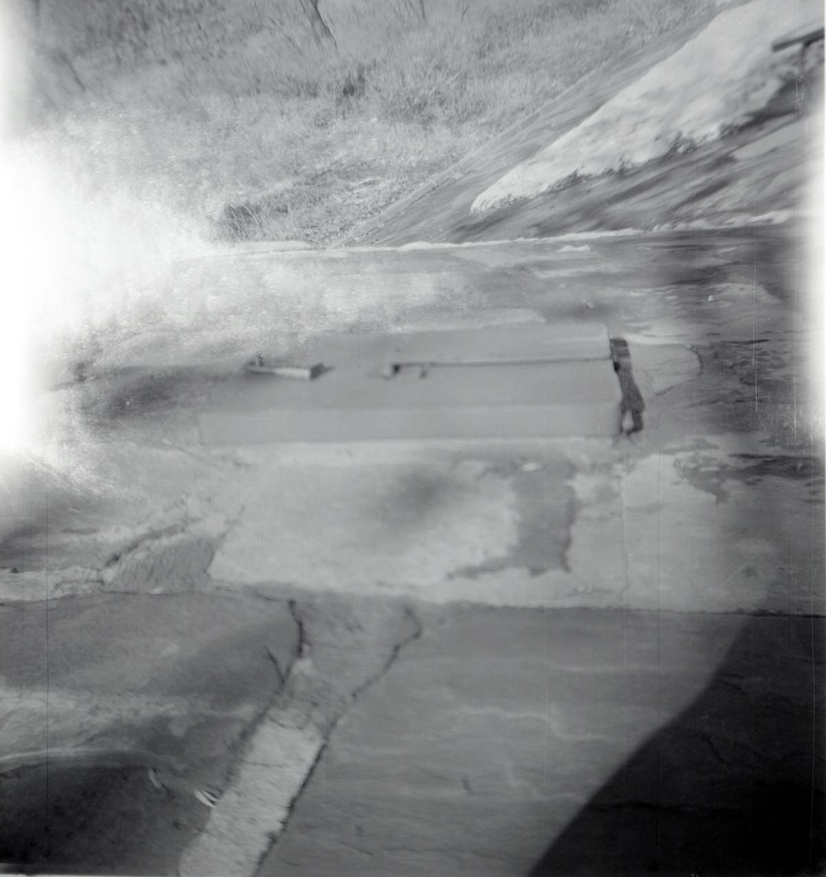 Park personnel installing a culvert/drainage pipe in location in Zion.
