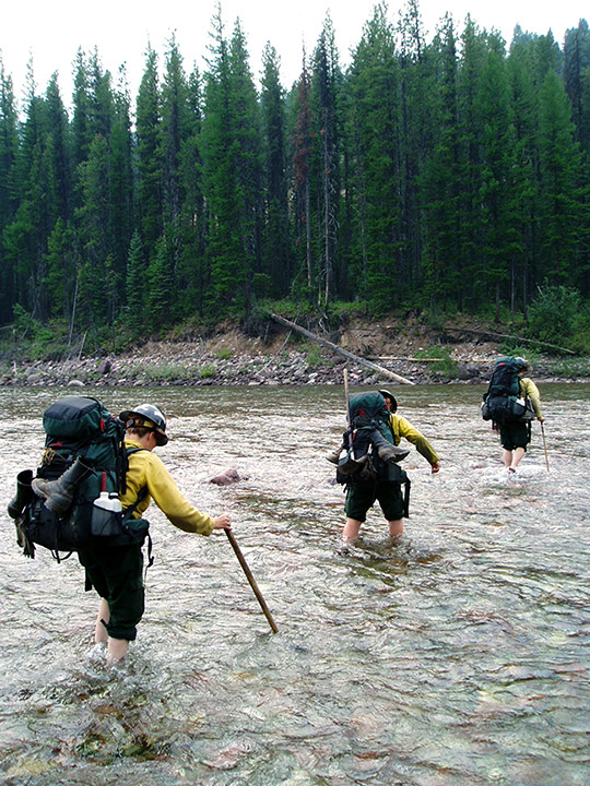 Three firefighters working the fireline