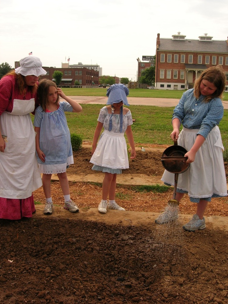 Ranger Keri Powers helps participants determine the proper amount of water.