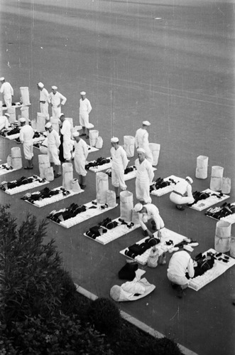 Servicemen turning out their bags