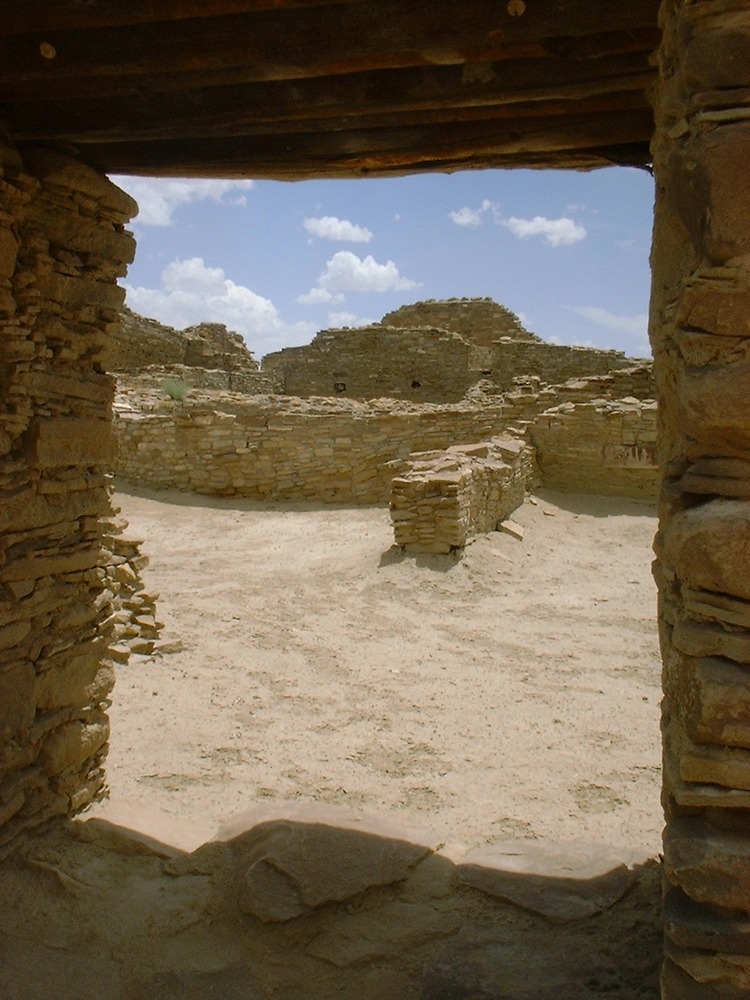 Chetro Ketl as seen through a doorway.
