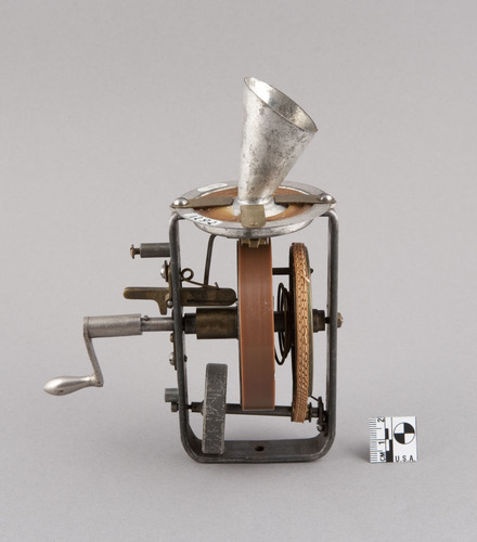 Edison Talking Doll cylinder on mechanism - view 1