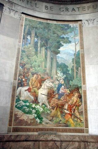 George Rogers Clark entering Kentucy upon a white horse. Other pioneers are with him as he first enters the fronteir lands.