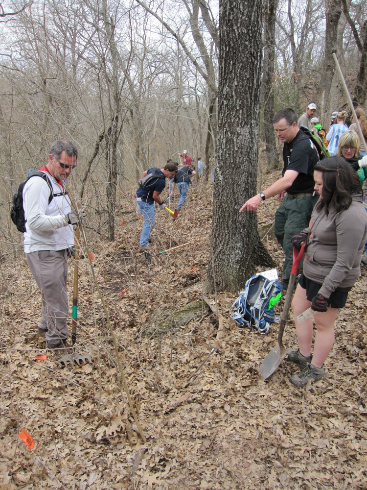 Park Ranger Randy Scoggins pointing to new trail location.