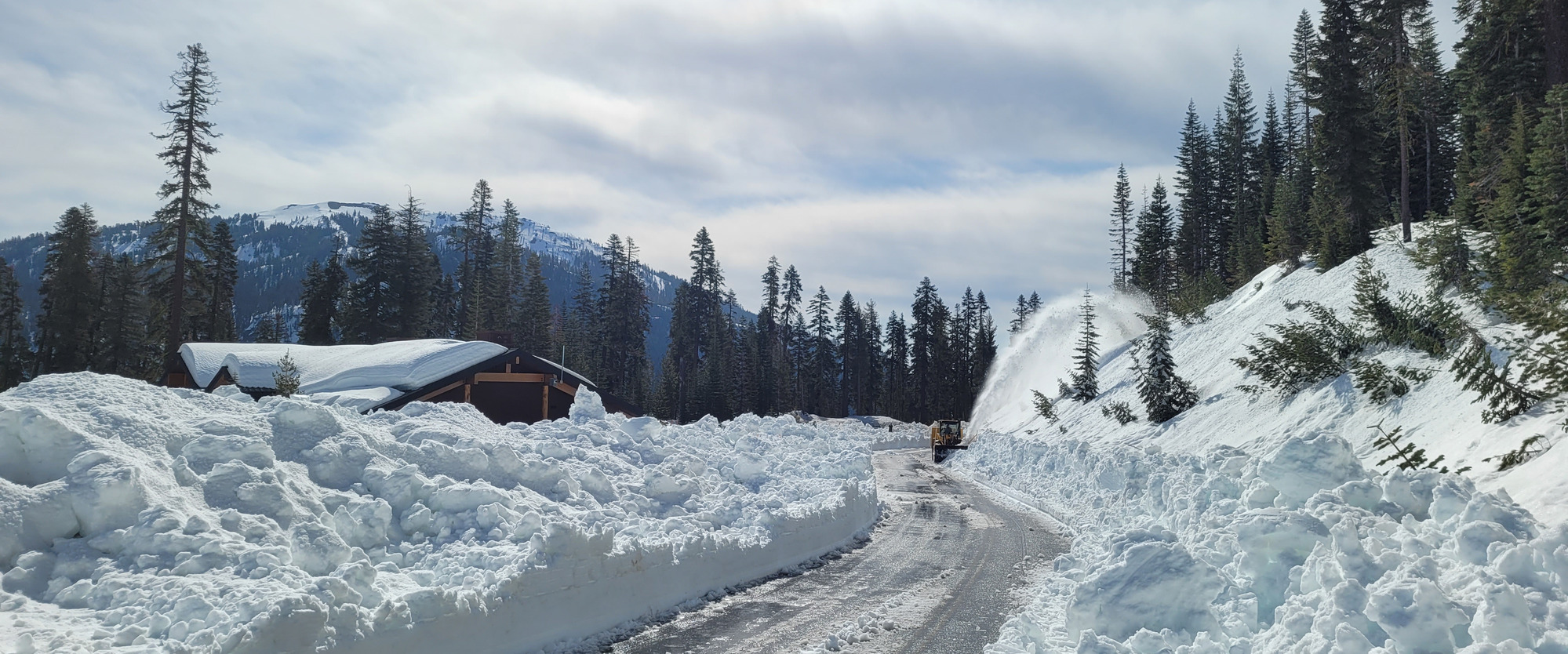Snow Clearing on Lassen Volcanic Highway. Rotary plow next to the Kohm Yah-mah-nee Visitor Center.