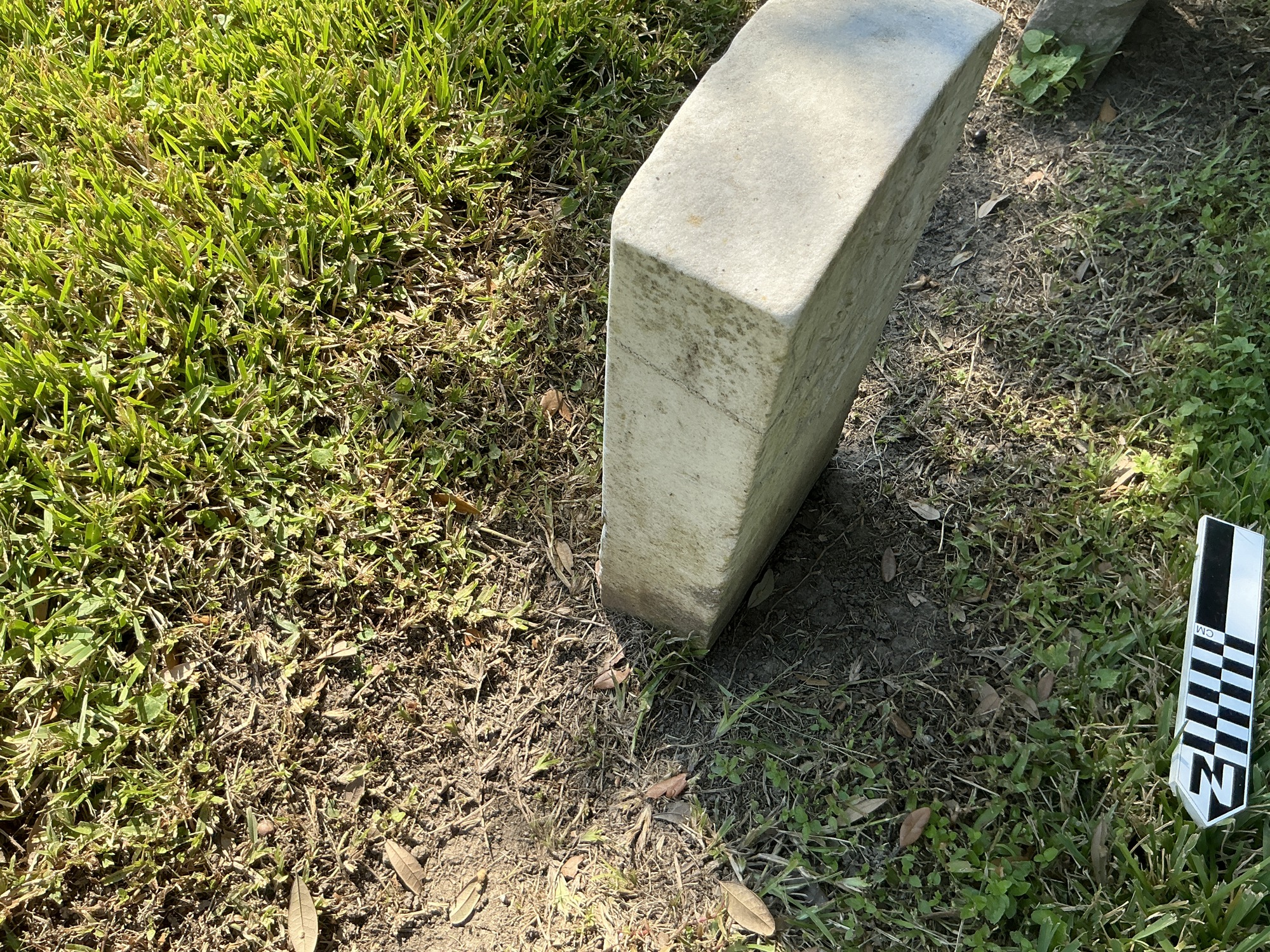 Extra image of historic upright marble headstone with recessed shield face.