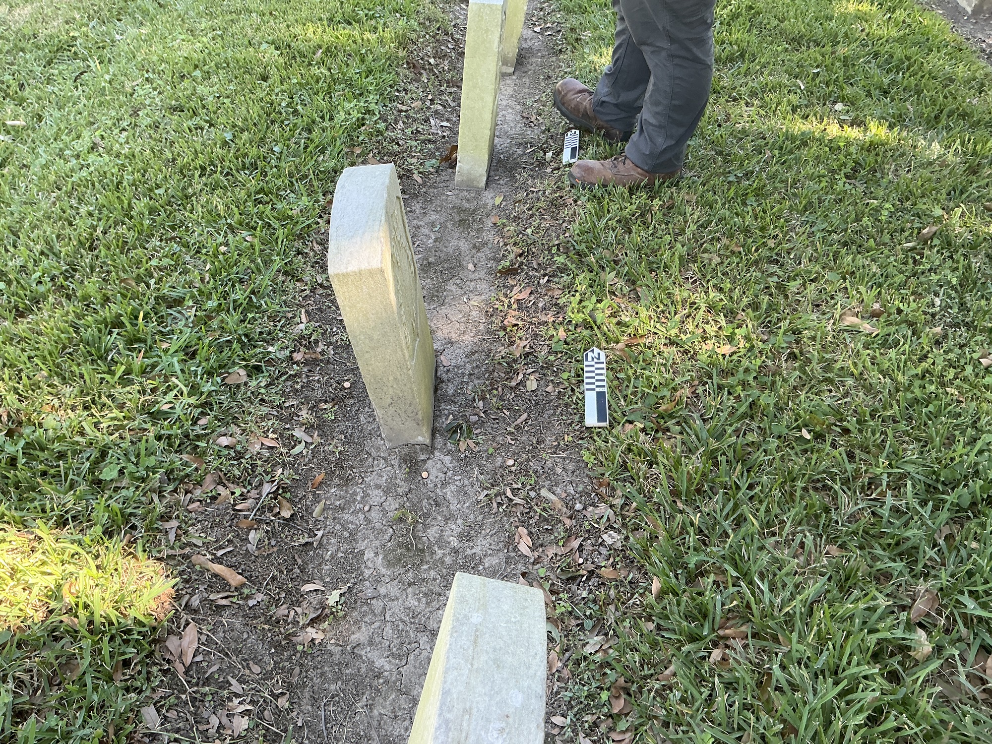 Extra image of historic upright marble headstone with recessed shield face.