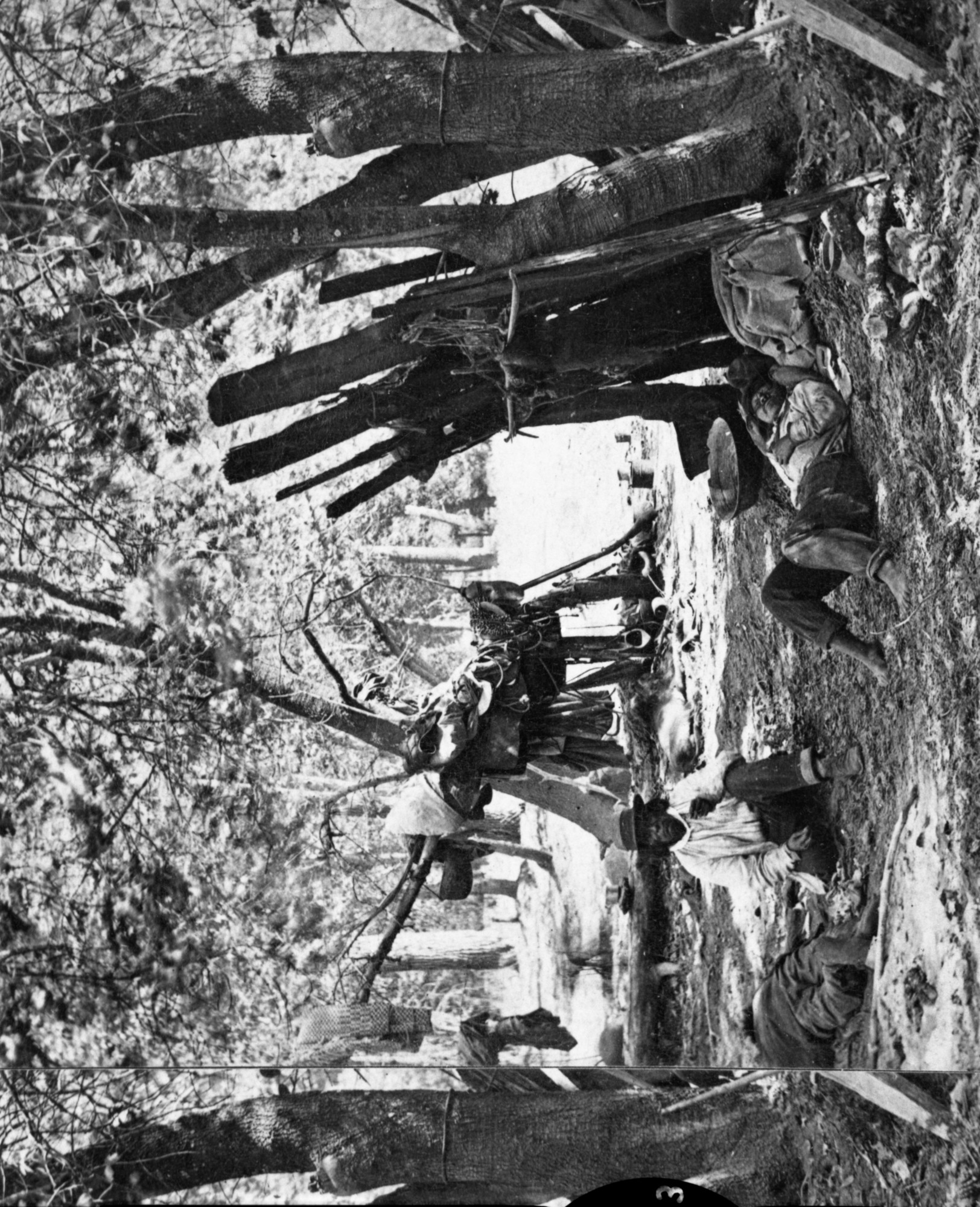 3 Native Americans on ground; 2 napping. Saddles on tree in Background. Detail from stereograph loaned by Lou Smaus, RL-16,631. Caption on card: "1578. A Summer Day's Work in the Yosemite". Note early date - Muybridge and Albert Bierstadt were traveling together when this was taken.
