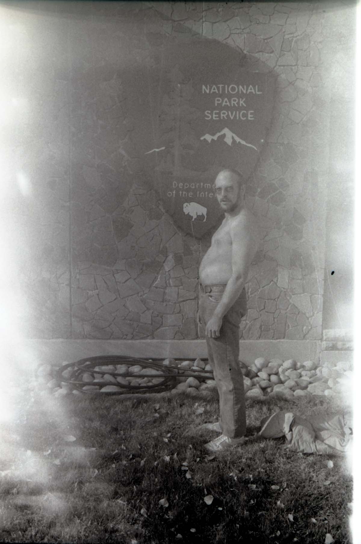 BW Photos of Interpretation Personnel. Man with beard sticking out his belly.