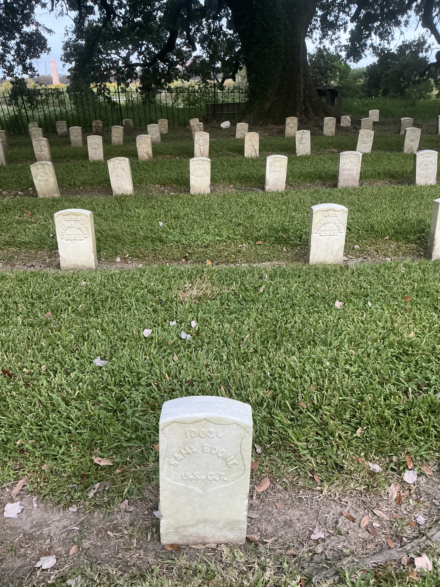 Extra image of historic upright marble headstone with recessed shield face.