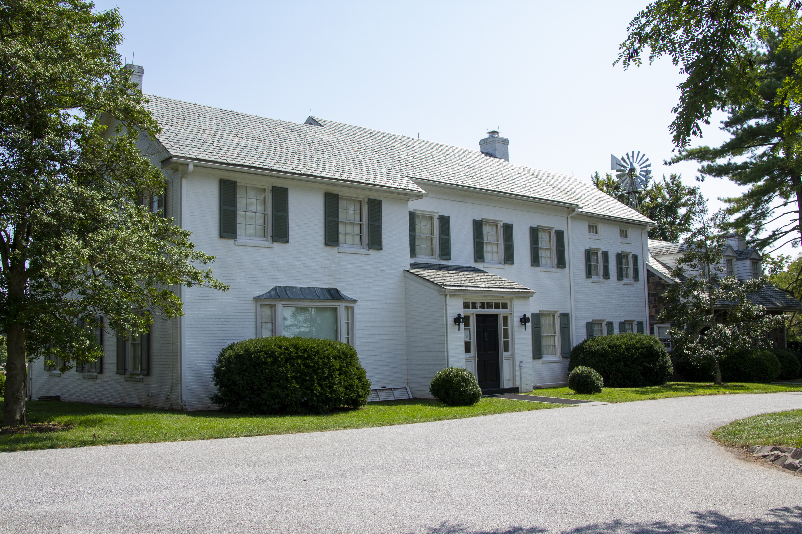 A two story white house.