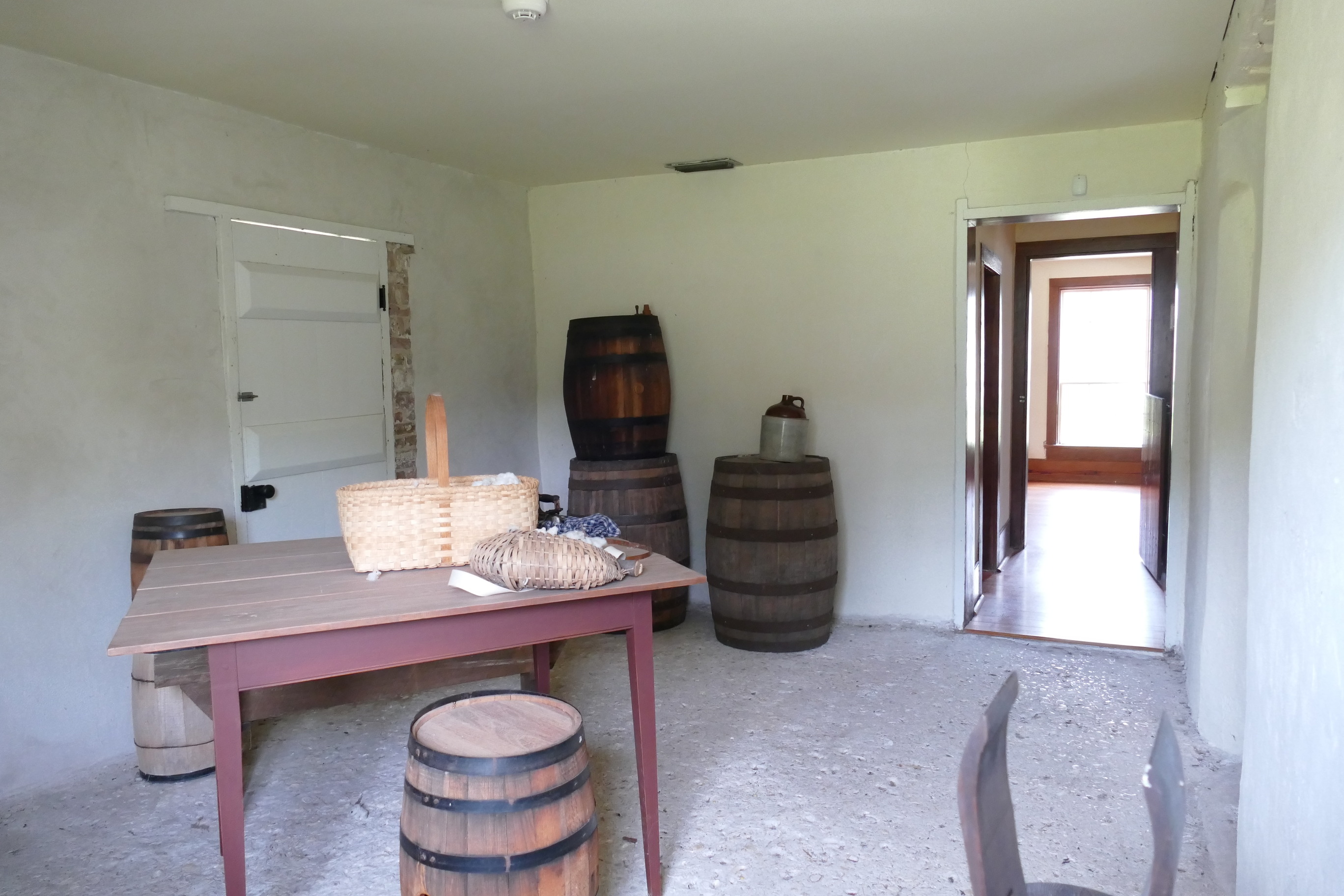 Tabby floored room with interpretive artifacts.