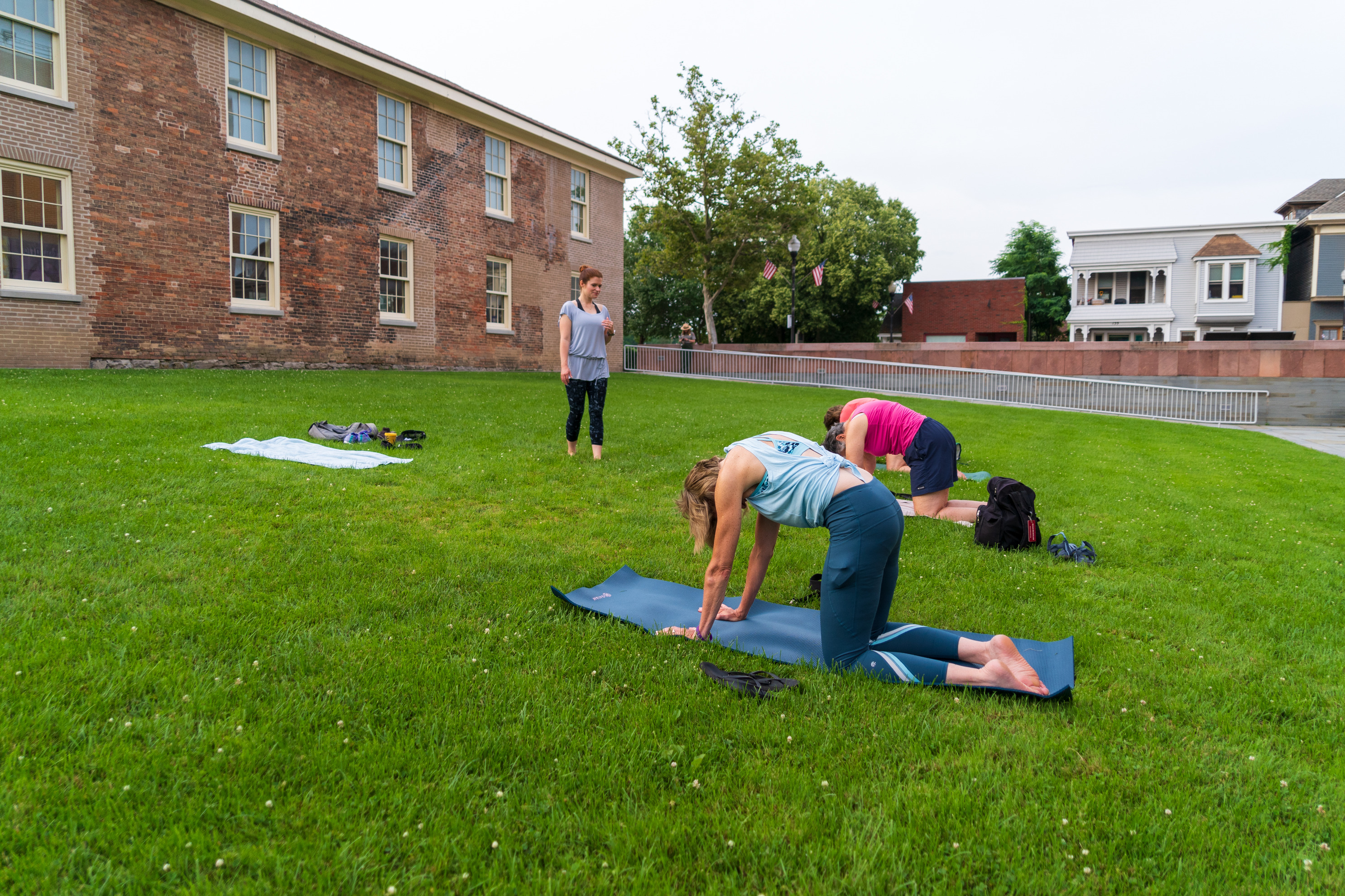 A yoga event on a lawn.