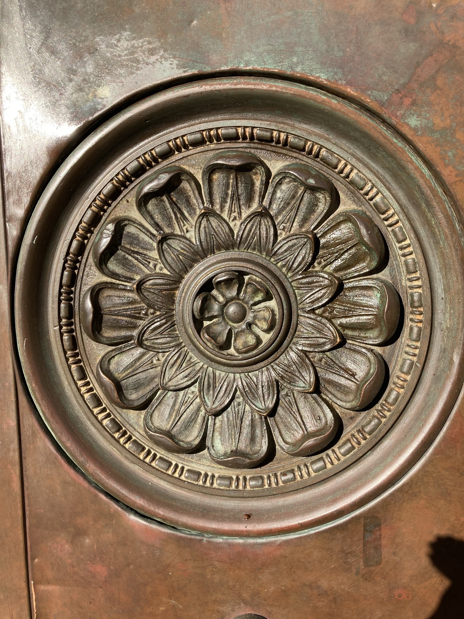Close-up of a floral decorative element that is in a circle. 