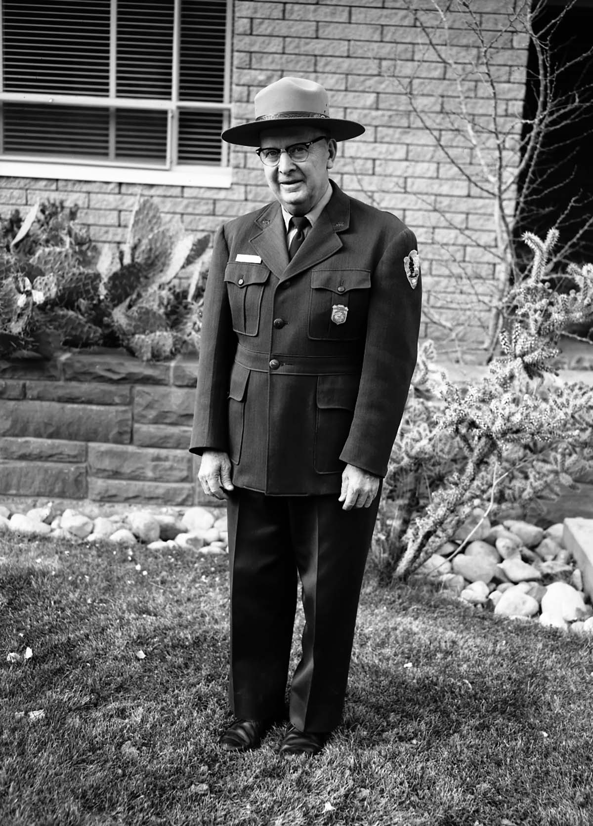 Chief Park Naturalist Carl E. Jepson at time of retirement. Mission 66 Visitor Center and Museum and headquarters.