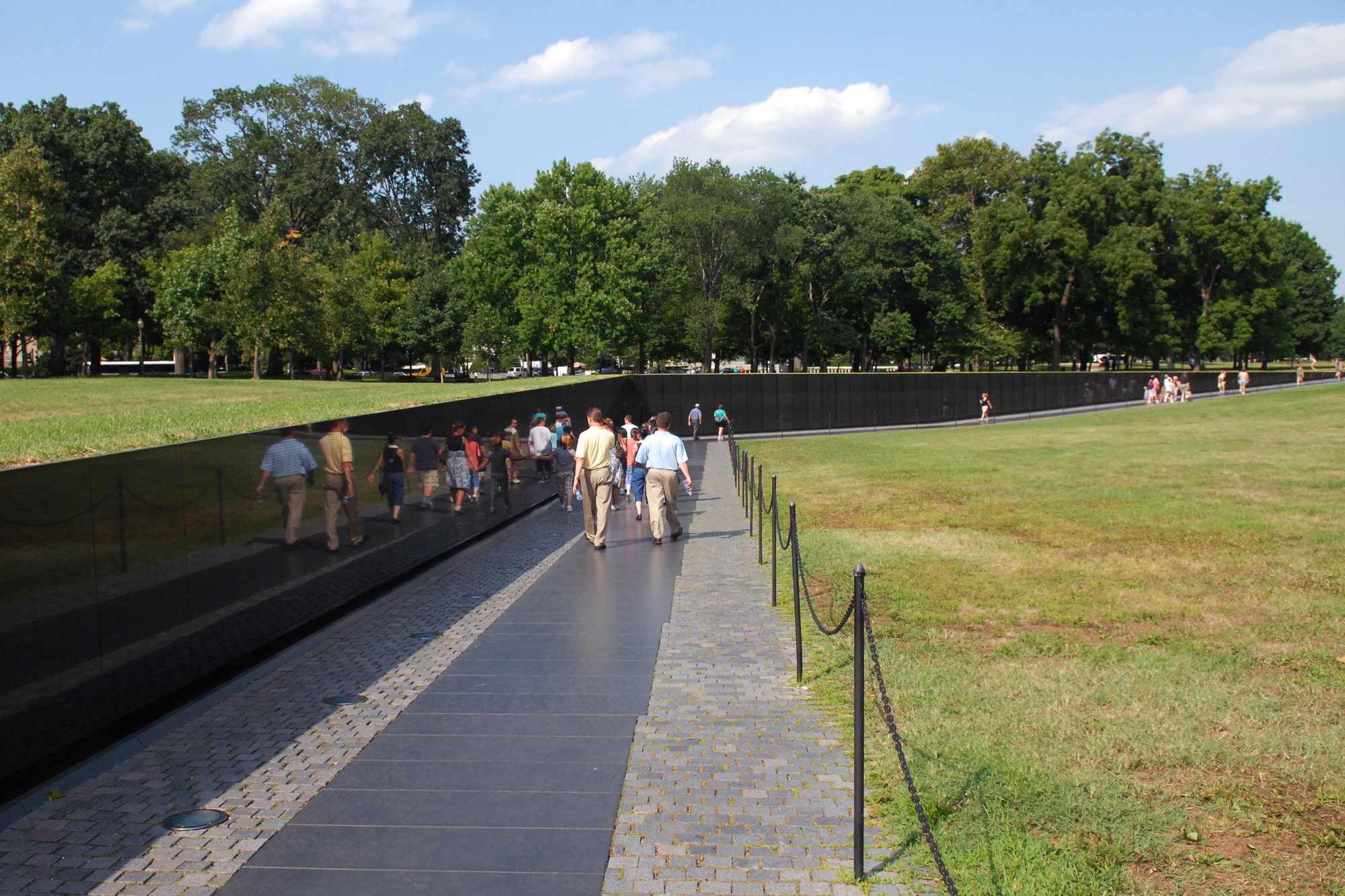Visitors walk past the Vietnam Veterans Memorial 
