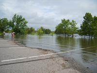 High water covers most of the Point Boat Ramp parking area.