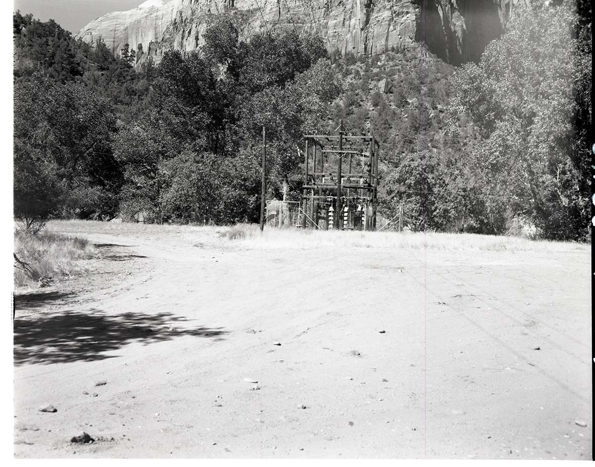 Electric power transformer at site of proposed water storage tank at the Utah Parks Company (Union Pacific Railroad) sewage disposal plant near Court of the Patriarchs and Birch Creek.