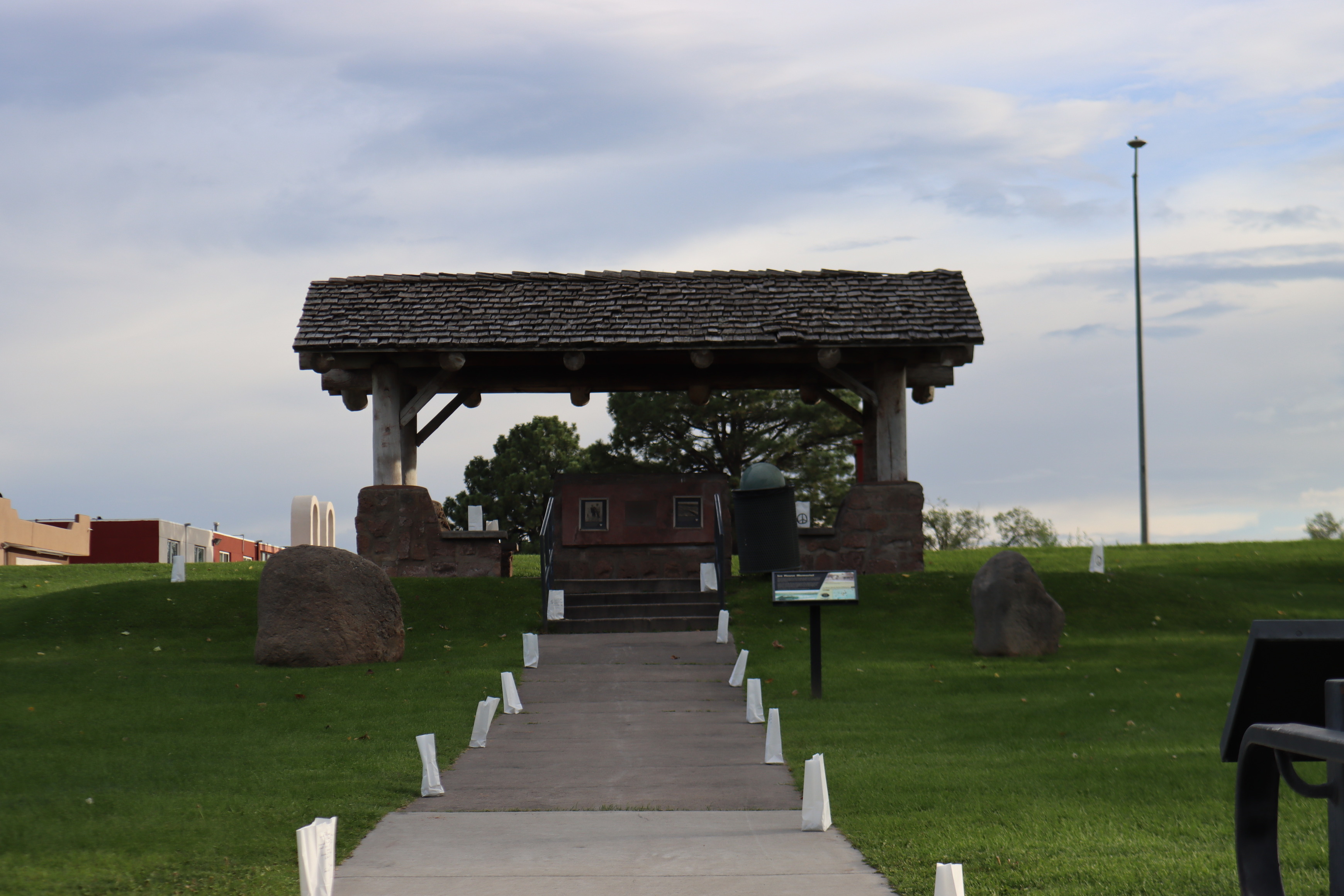 Luminarias line a path toward a gazebo.