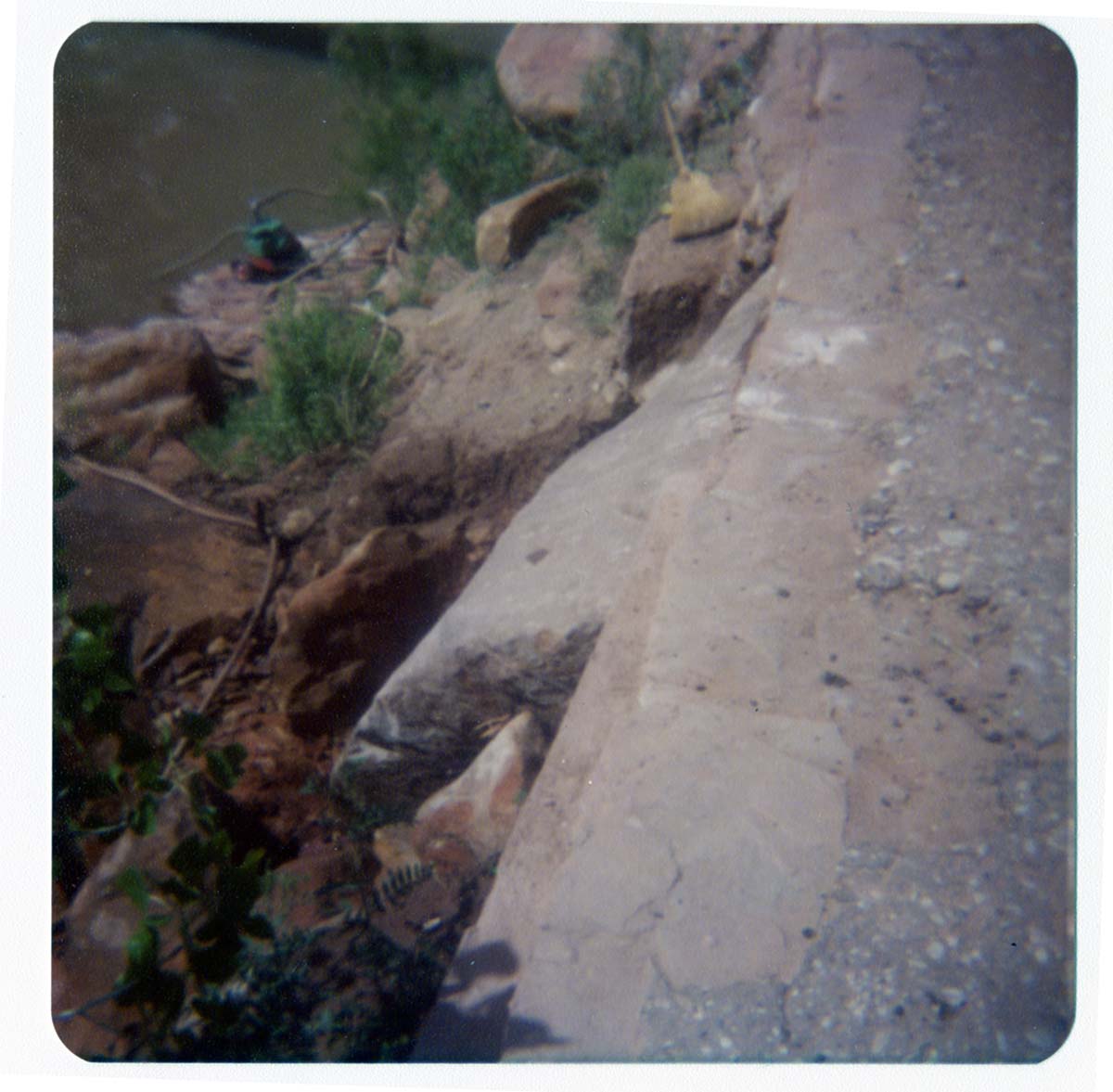 Area being cleared to construct abutment for new Grotto footbridge.