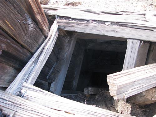 Open shafts and adits at Bighorn Mine, an abandoned gold mine in Feb 2007 and Jan 2009.
