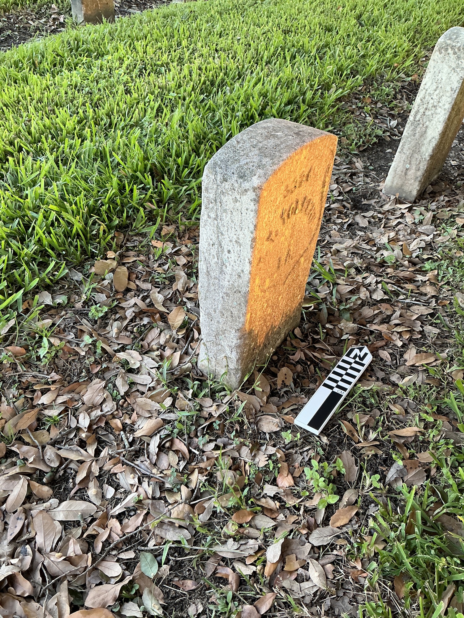 Extra image of historic upright marble headstone with recessed shield face.