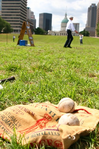 Vintage Baseball at the Gateway Arch, baseballs on burlap bag in the foreground