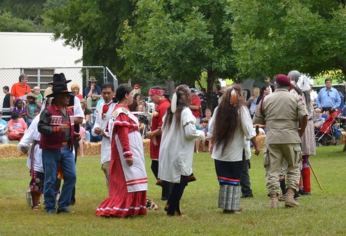 Muscogee (Creek) dancers in a circle.