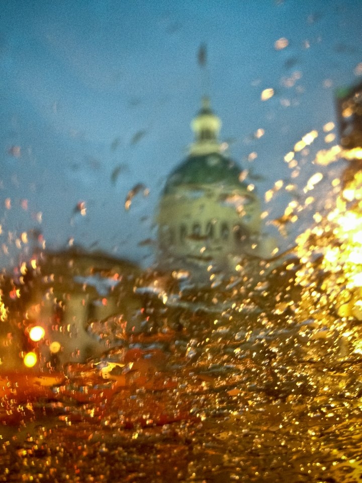 Blurred image of Old Courthouse as seen through an icy car windshield