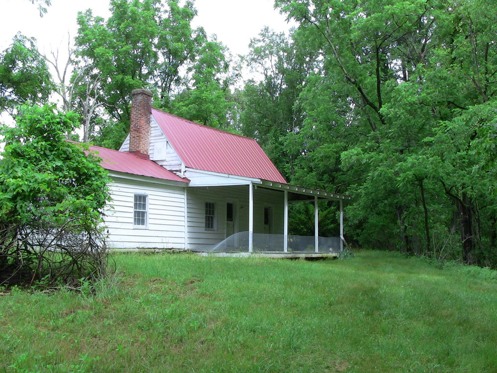 small historic house with porch