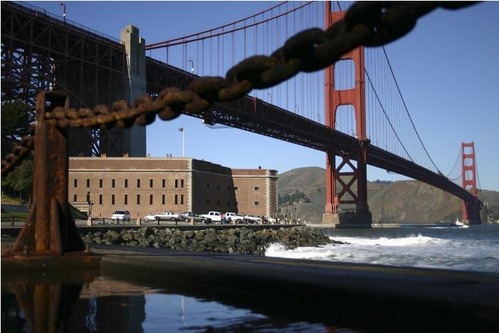Exterior of Fort Point from Marine Drive and the Golden Gate Bridge stretching to Lime Point.