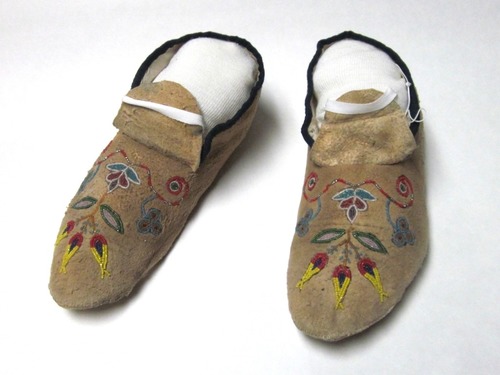 Moccasins with complex floral pattern