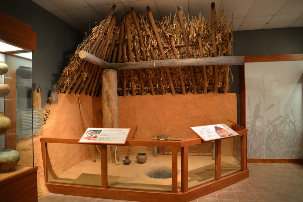 A wattle and daub house display in the park museum.
