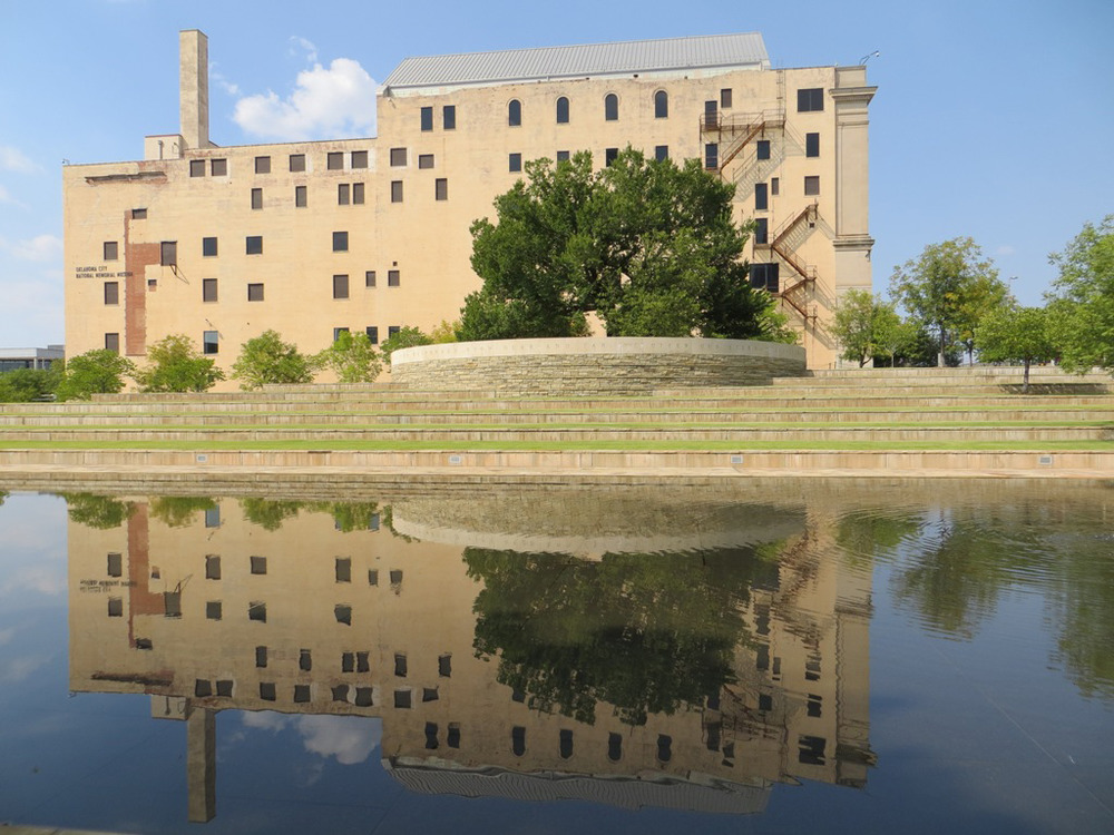 Reflection of the Journal Record Building in the Reflecting Pool