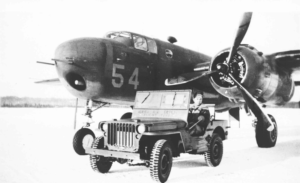 B-25H, parked with a jeep