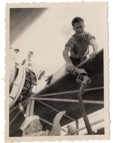Crewmen refuel their PBY