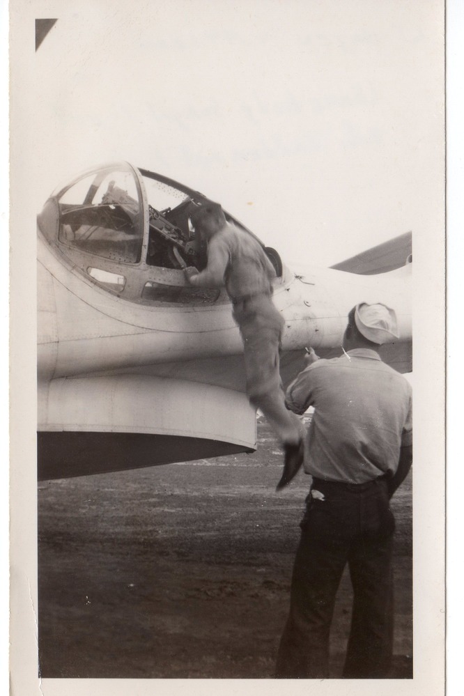 Crewmen and their PBY