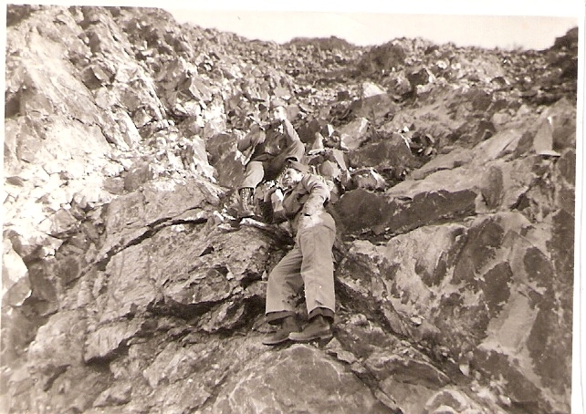 Cliff Williams and friend on watch in the mountains, the Aleutians