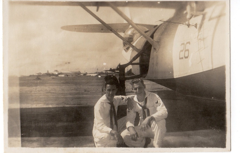 Two crewmen and their PBY