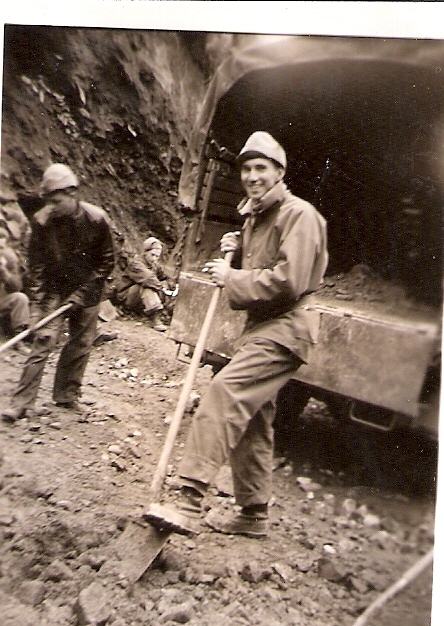 Members of the 206th C.A. Band doing road work