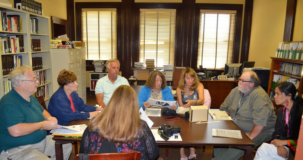 A family meets with park staff