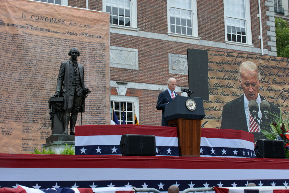 VP Joe Biden speaking in front of Independence Hall with Constitution and statue of George Washington in background