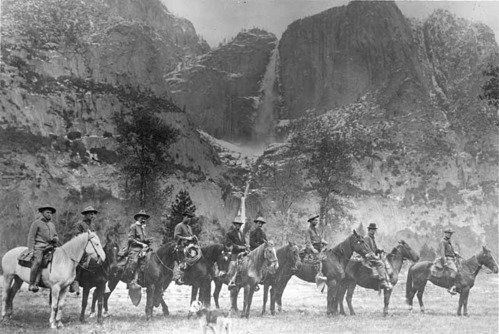 Nine men in riding clothes and mounted on horseback were Yosemite's first rangers.