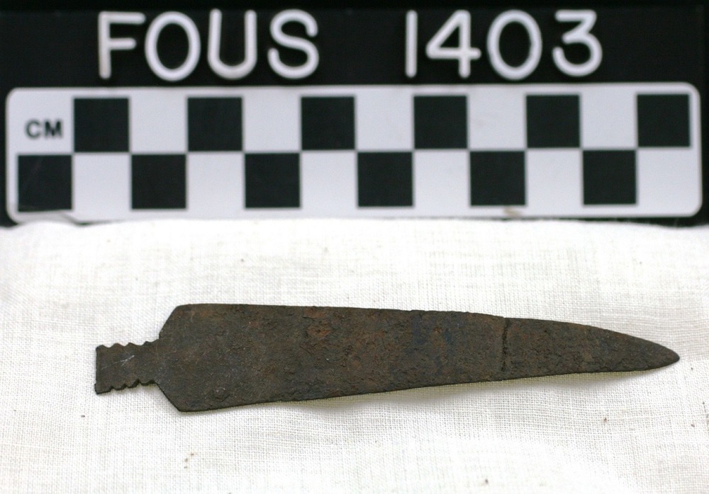 Metal projectile point.