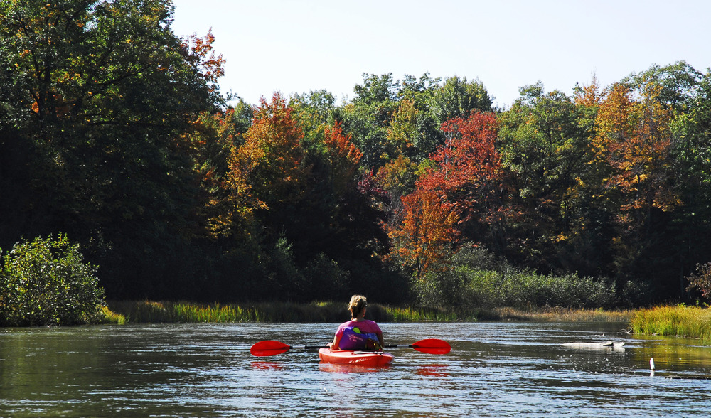Paddling the Platte River surrounded by vivid fall colors