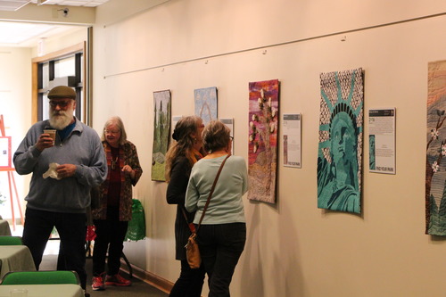 park visitors admire National Park quilts